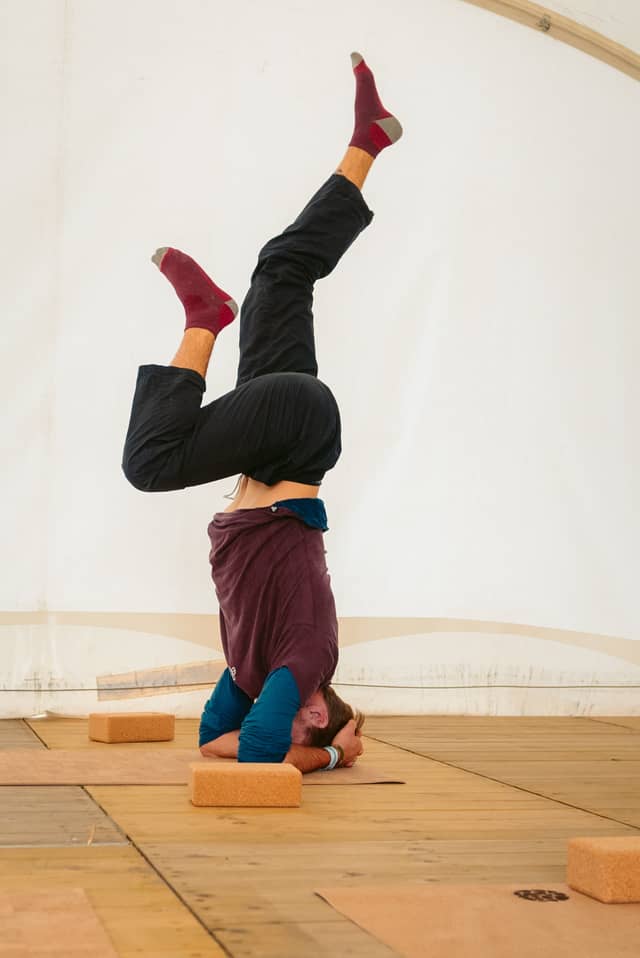 Rock Werchter Headstand Legs Crossed