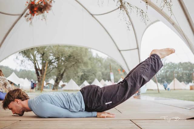 Man In Locust Pose On PIERRE Mat
