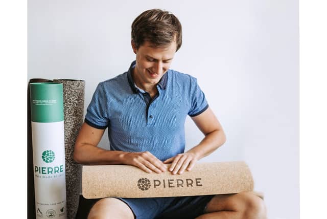 Man Rolling PIERRE Cork Yoga Mat