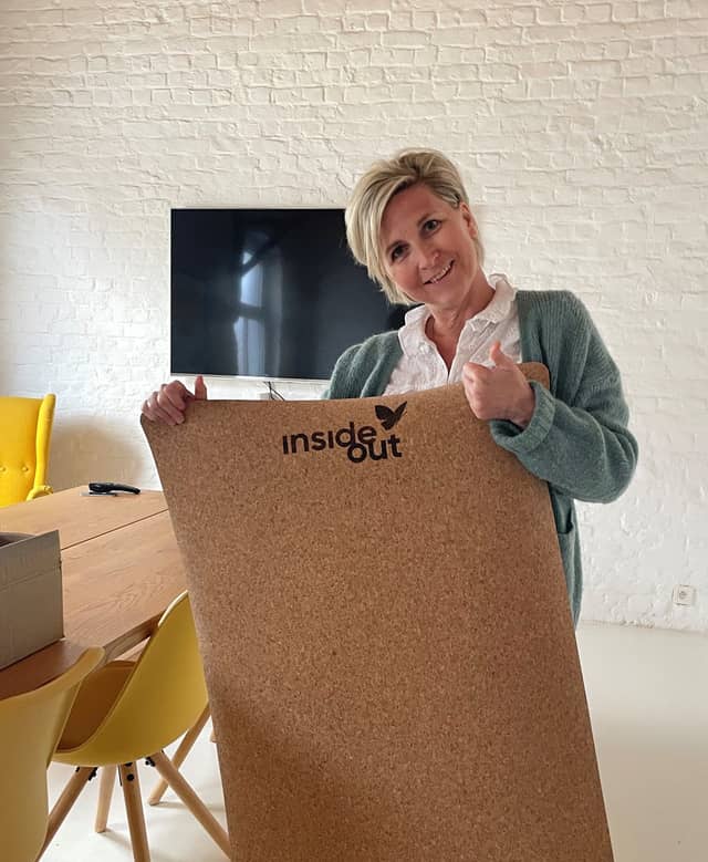 Woman Holding Custom PIERRE Cork Mat