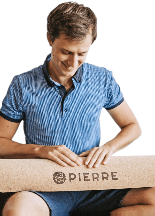 Man Holding PIERRE Cork Yoga Mat