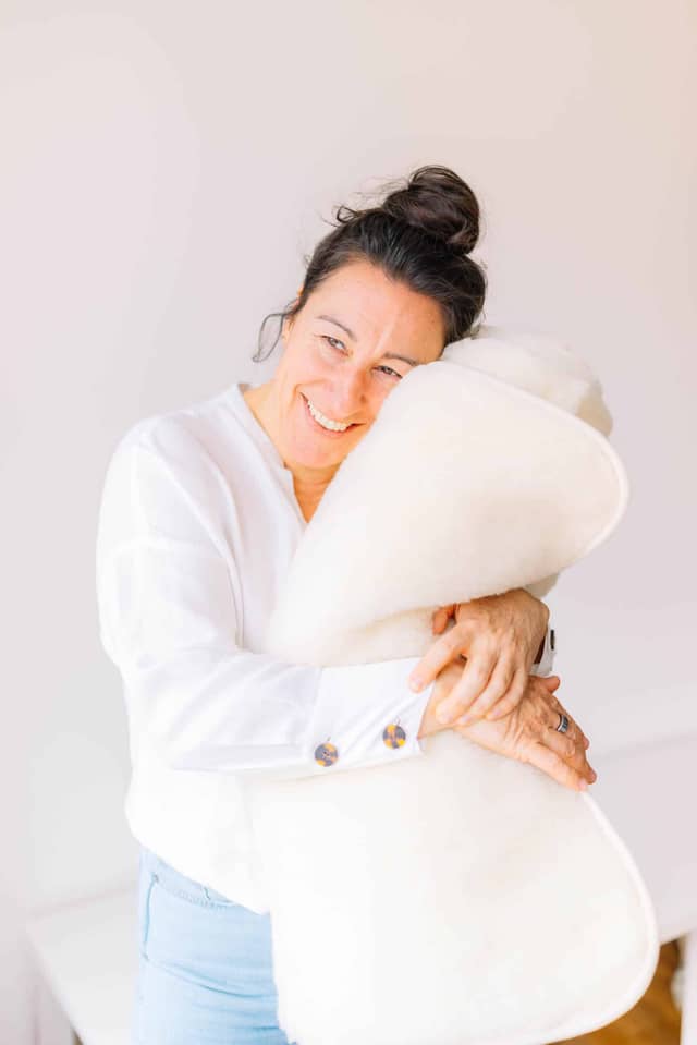 Woman Holding PIERRE Wool Yoga Mat